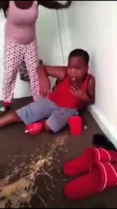 Kid ate mentos and drank coke. Mom beats him