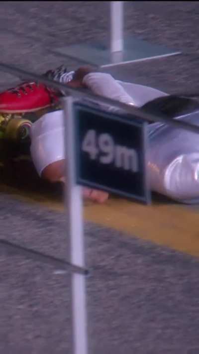 Limbo skating under a 50 meter stretch of increasingly lower poles