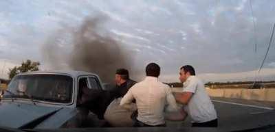 Bystanders rescue older people from a car accident