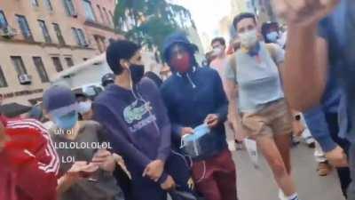 Protesters get pissed at a live streamer for asking them to flip over a truck