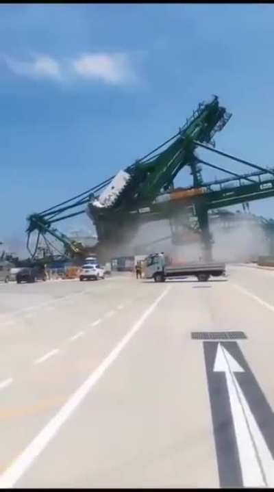 Wow, that's a massive crane going down.