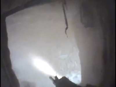 Room cleaning Special Forces working with the Afghan National Army. The first man through the door is ANA. His weapon is hit, he turns and runs out the door, and is shot and killed off camera, before being neutralized by Special Forces. Around 2011.