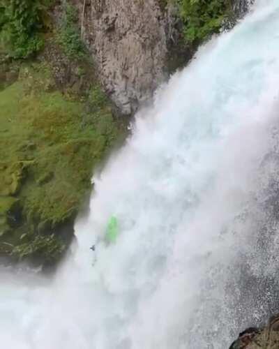 sending it off an 80 foot waterfall in Oregon