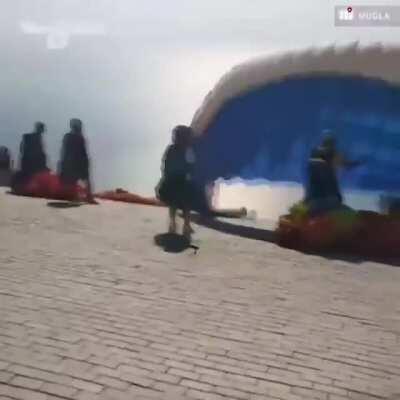 Mugla in Turkey's 100-year-old Düriye Çakar made two paragliding at the request of grandchildren.