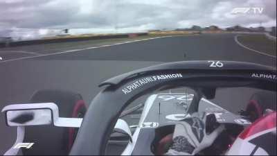 Kyvat gives Latifi an Italian hand gesture post-race, venting his frustrating over the final laps