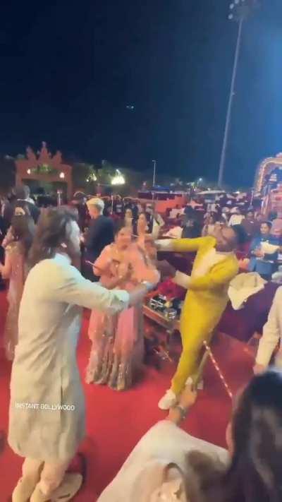 MS Dhoni and Dwayne Bravo playing Dandiya at Anant Ambani's wedding.