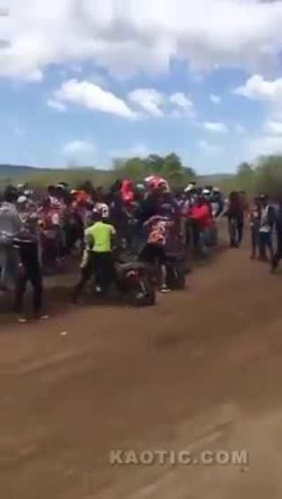 Fight breaks out on racetrack. Race doesn't stop.