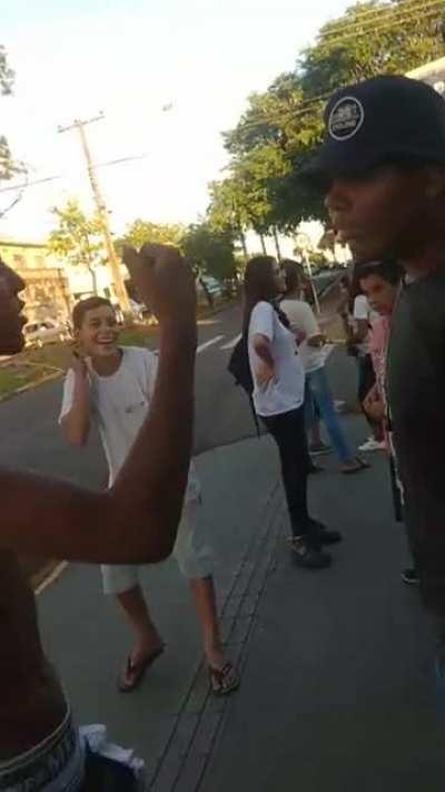 bully gets two slaps off before meeting the ground