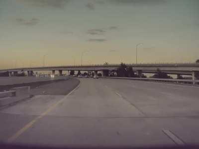 Idiot running across the freeway