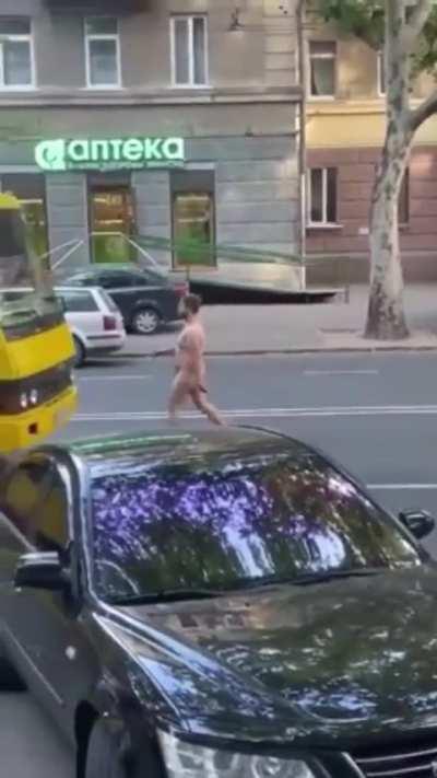 to intimidate cars all the way down the block completely naked