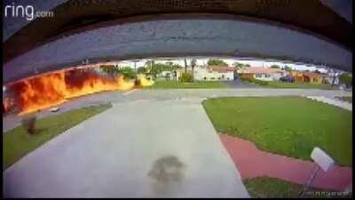 Airplane crash lands on a Florida residential street, smashing into a car. Multiple casualties confirmed.