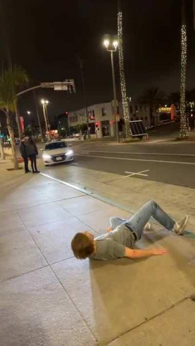 Friend tries doing front flip off wall after getting hammered
