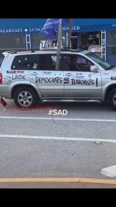 A Trump supporter drives up