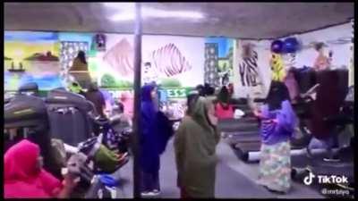 It looks like Jahanam fitness club. Bean bags working out.