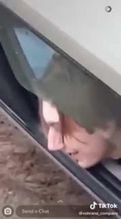 Drunk guy in wrecked car. Translation in comments