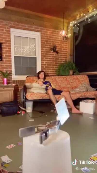 Throwing a card between two quarters in a spinning clamp. (Sorry about the TikTok audio)