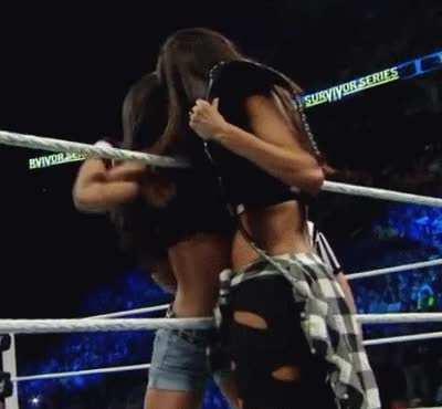 Brie kisses AJ Lee