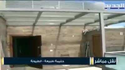 Al-Jadeed Reporter, Halima Tabia, Interviews Worker at Building Thought to Have Sniper on Rooftop. The Worker Denies All Allegations; 