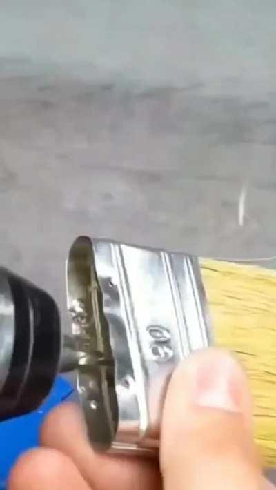 I'm sure a botlle of paint hanging there make everything easier