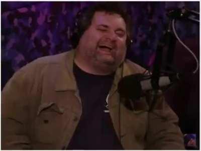 Artie cries laughing watching video of him eating.