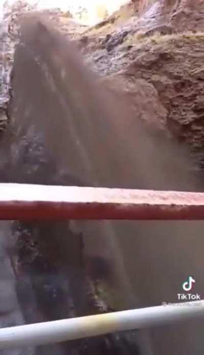 Opening a dams gate after being closed for years.