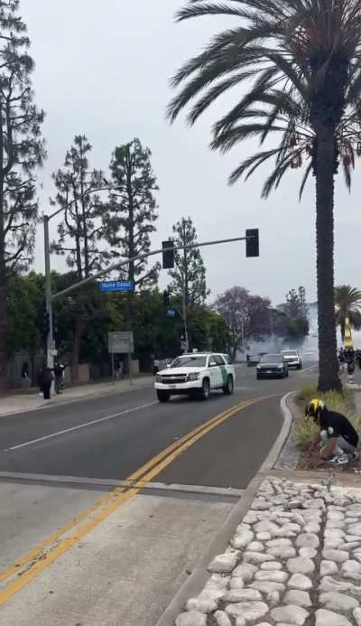Paramount California Protestors throw stuff at ICE Border Patrol Vehicles After Raiding Home Depot