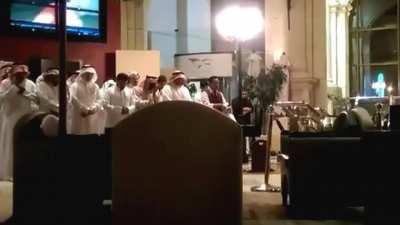Waiter leading a prayer inside a coffee shop. Beautiful recitation.