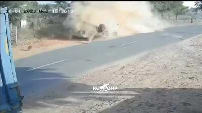 Indian man ejects from vehicle during roll