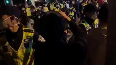 Protestors being arrested in Shanghai, China