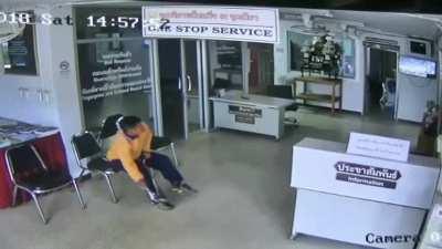 Dude sitting a lobby gets attacked by a snake