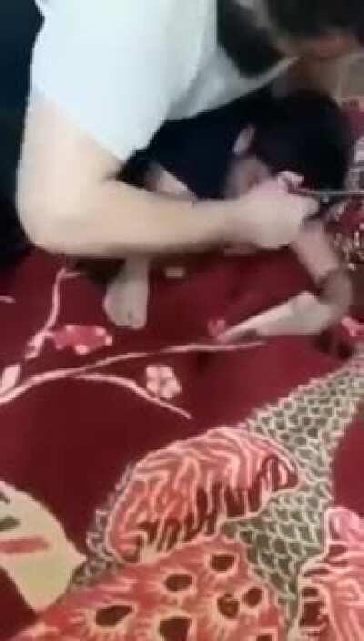 Instant regret when TikTok prankster cuts sleeping man’s beard!