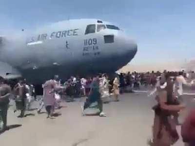 Afghans desperate to get out on the last flights from Kabul Airport