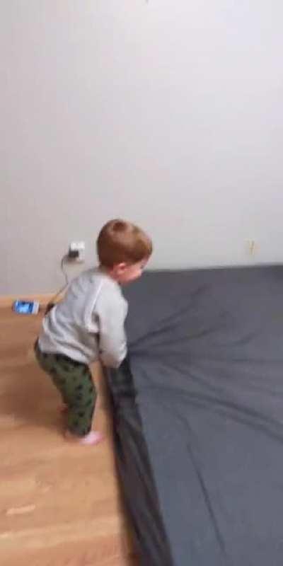 My son was pretending our bed was water. This was the first time he tried to jump backwards.