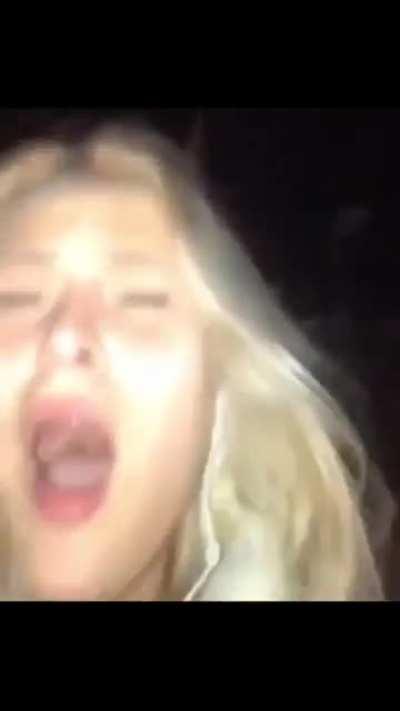 WCGW Demonstrating pepper spray in the air in front.