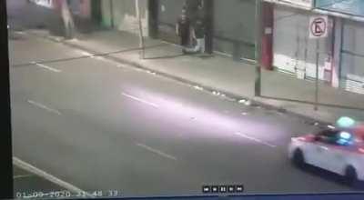Thief is caught in the act by the police CCTV, is arrested almost immediately after being hit by the police car.