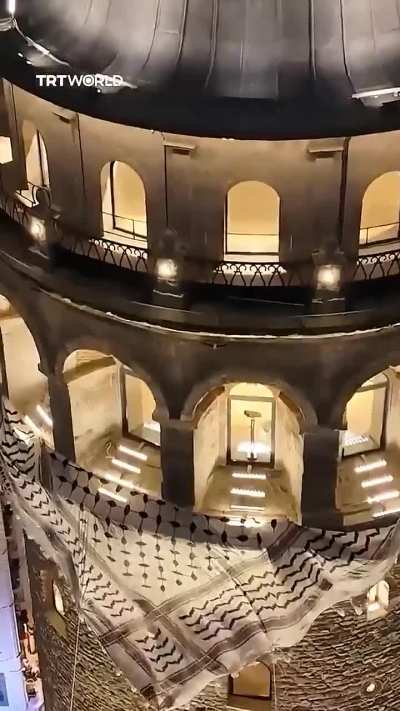 Istanbul’s Galata Tower draped with Palestinian keffiyeh