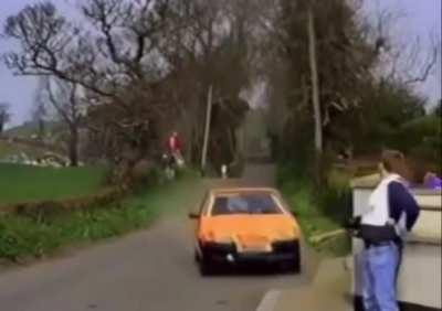 This photographer narrowly avoiding death while photographing a car