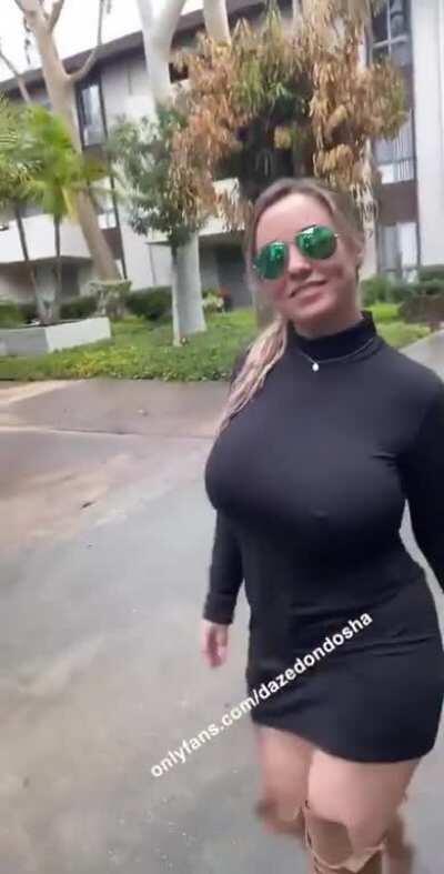 Busty babe passing by