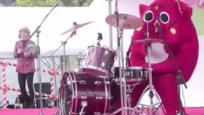 This guy's subtle drumming at a children's concert