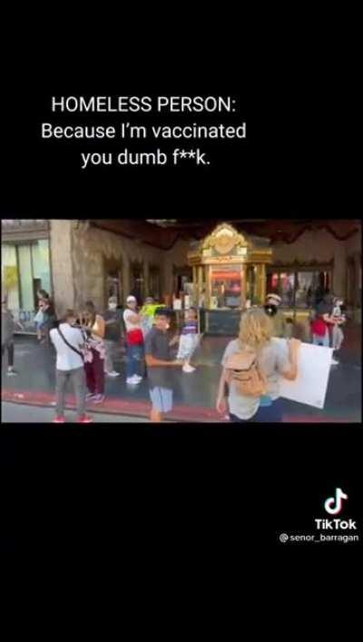 Homeless man replying a Anti-vaxxer's campaigner.