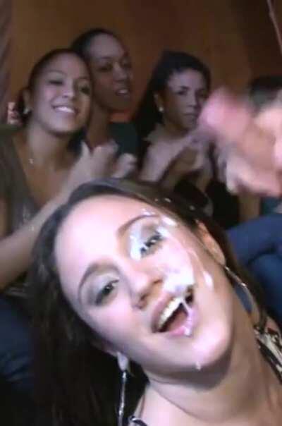 Letting a male stripper jizz all over her face