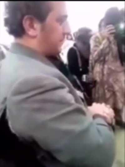 Taliban sets a musician's instruments on fire and the musician can't hold his tears.