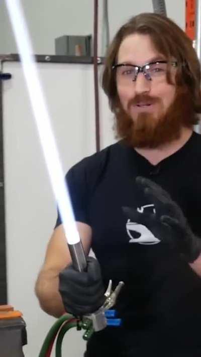 The World's First Fully Functional and Retractable Light Saber