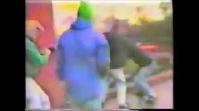 Irish Republican Army (IRA) fire AK47s at unknown assailants on the streets of Ireland/UK