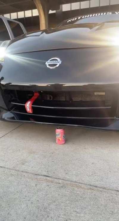 Trying to crush a Soda can