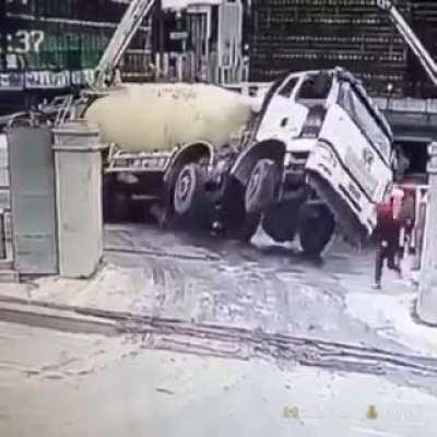 Backing up a cement truck at a construction site