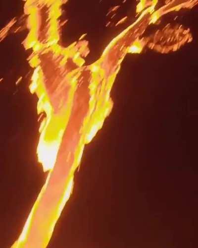 Drone soaring trough erupting volcano