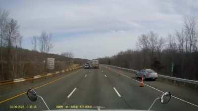 God forbid someone might have to drive behind a tractor trailer for 1.5 miles of construction