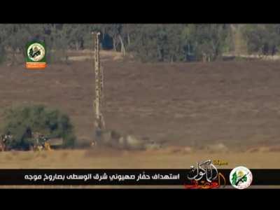 An IDF Bulldozer Was Targeted By An Al Qassam Brigades Kornet Missile East Of Shujaiya Gaza.