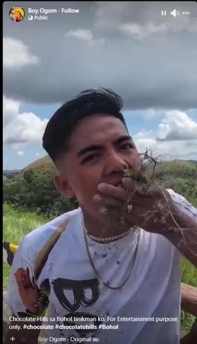 Guy tastes the Chocolate Hills